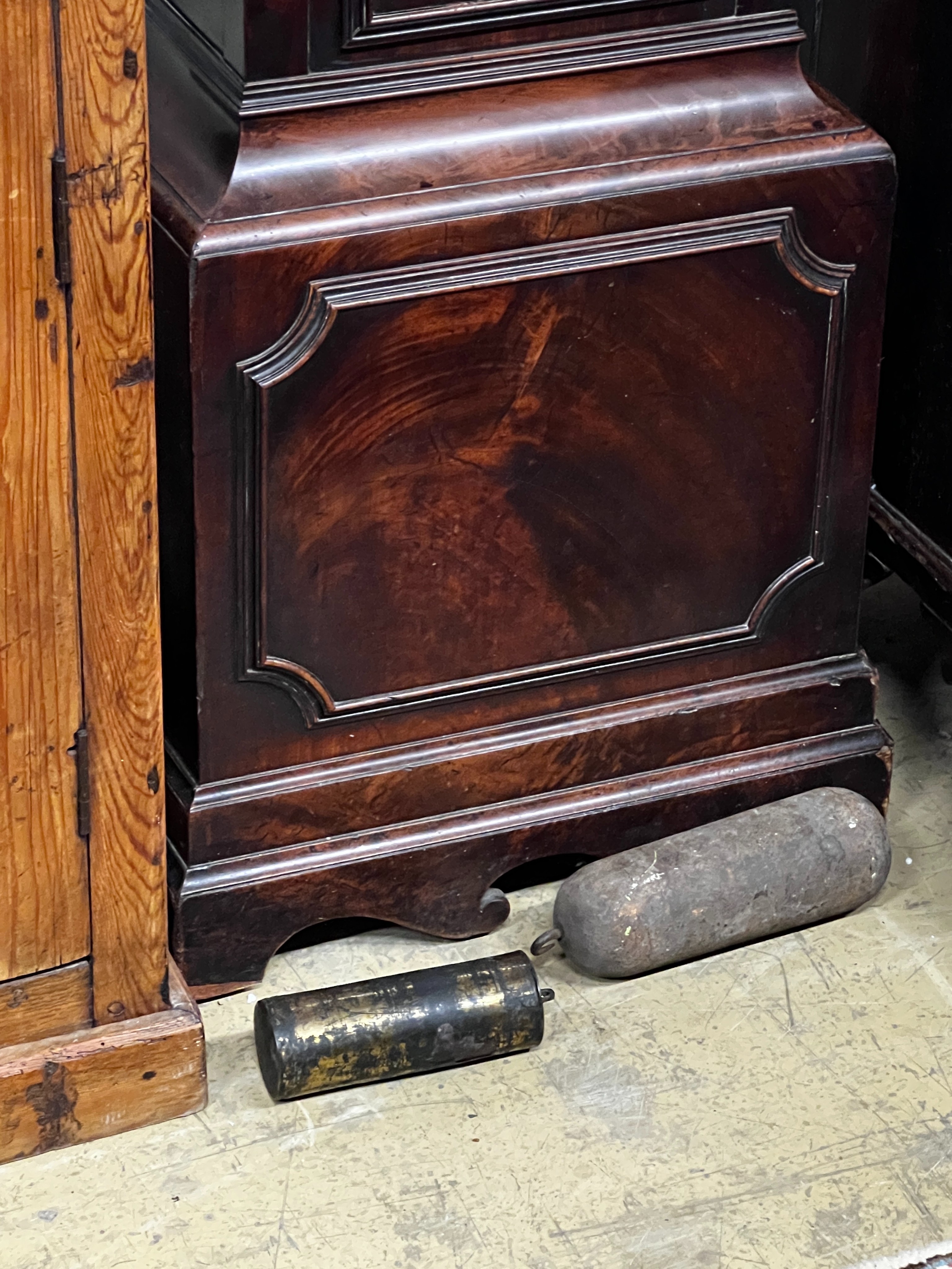 A George III mahogany 8 day longcase clock, the 12in arched silvered dial, marked Charles Bright, London, height 219cm